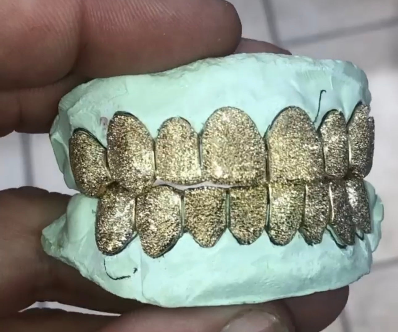 10 Karat Gold Grill + Design