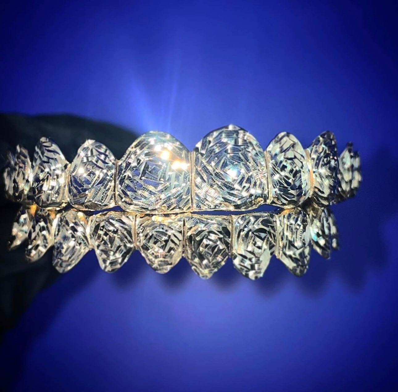 10 Karat Gold Grill + Design