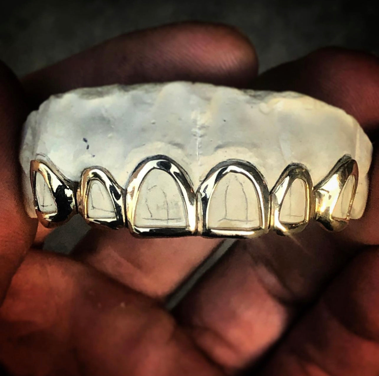 14 Karat Gold Grill + Design