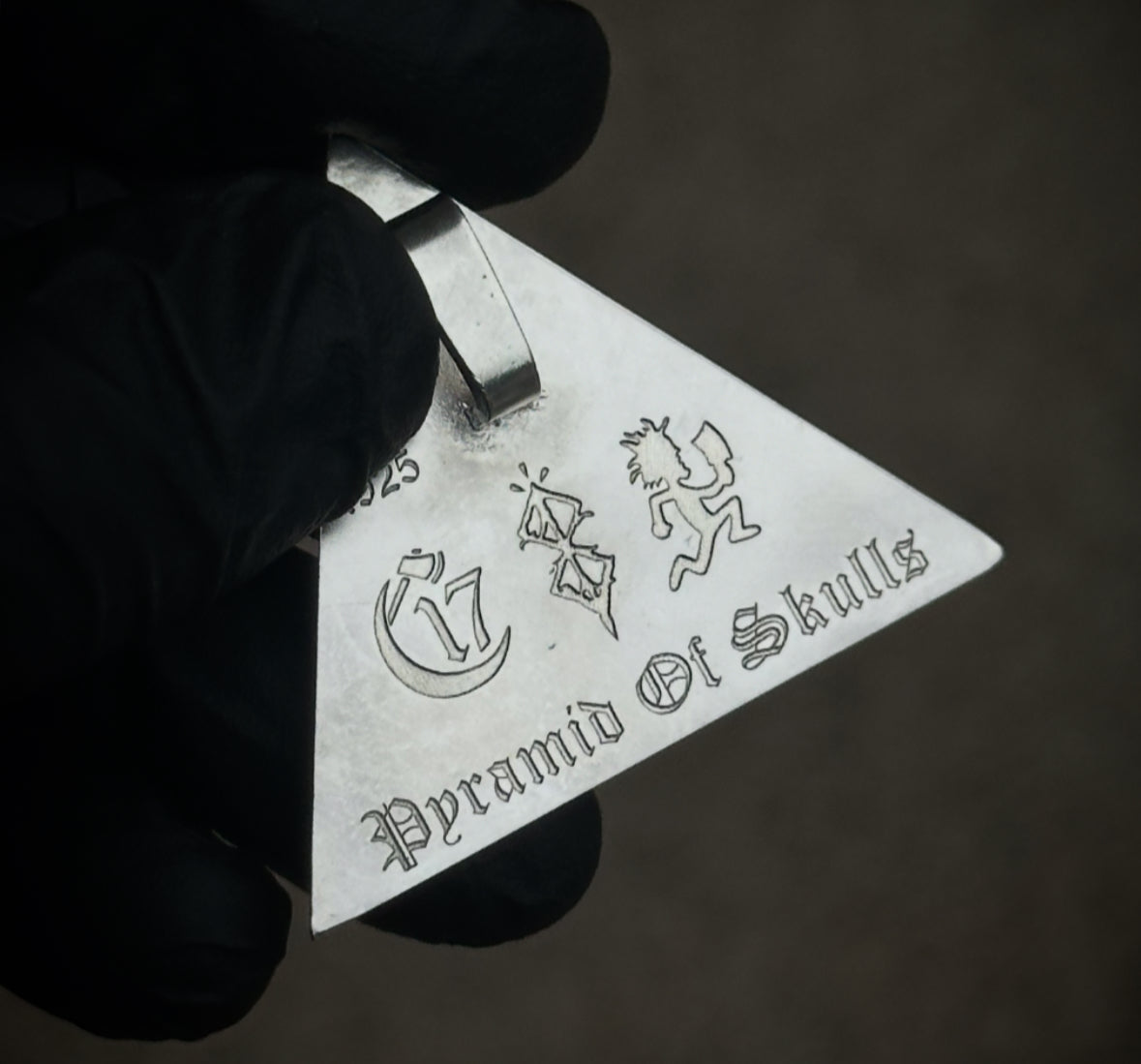 Pyramid Of Skulls silver pendant